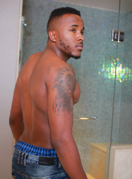 American beefy Brendan Phillips and superstud  phoenix Fellington in interracial cock sucking scene in hot shower