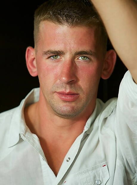 Well-built Dean posing nude and showing his butt