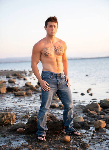 Lane and american strongman Jax Hayes fuck ass after sucking cock on the beach