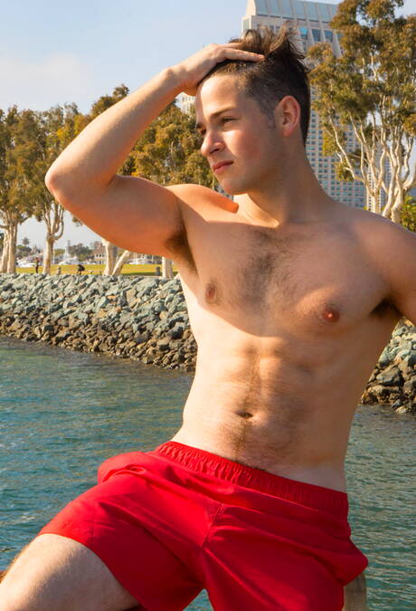 Husky guy Lane and strongman Archie in hot ass fuck action on the beach