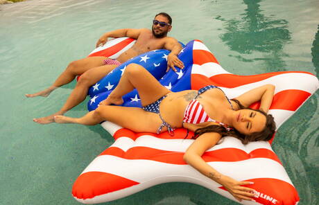 Bisexual orgy in the pool on american national flag