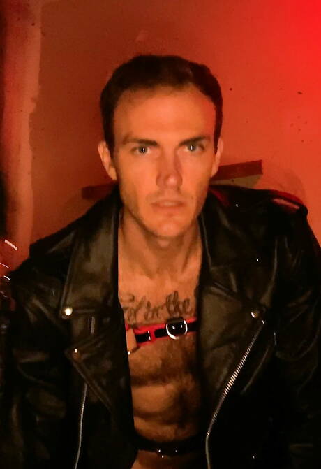 American hairy stud Christian Wilde in leather teasing his cock