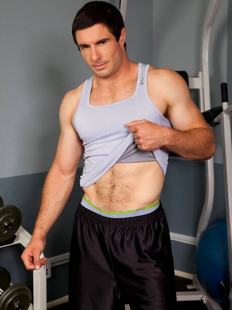 Bodybuilder Landon Mark undressing and showing tight ass