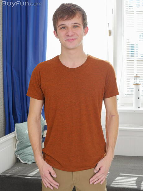 Hot twink Liam Rose undressing and showing hot ass